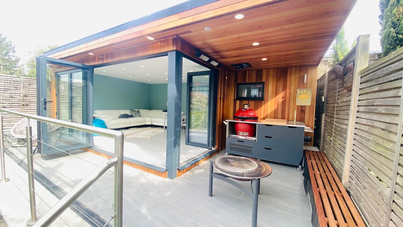 Garden room with adjoining shed and green roof, Ladywell, Lewisham.